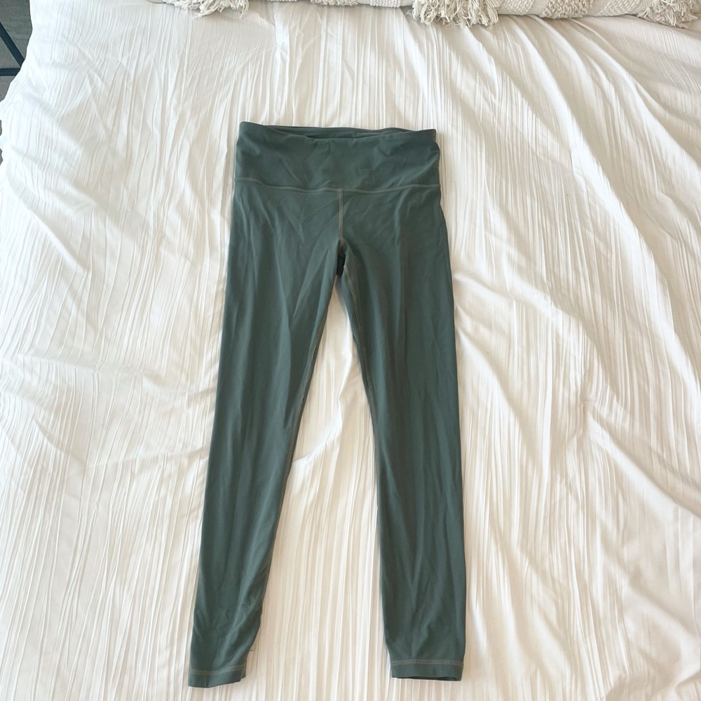 2 Athleta leggings in good condition. Size MEDIUM.
